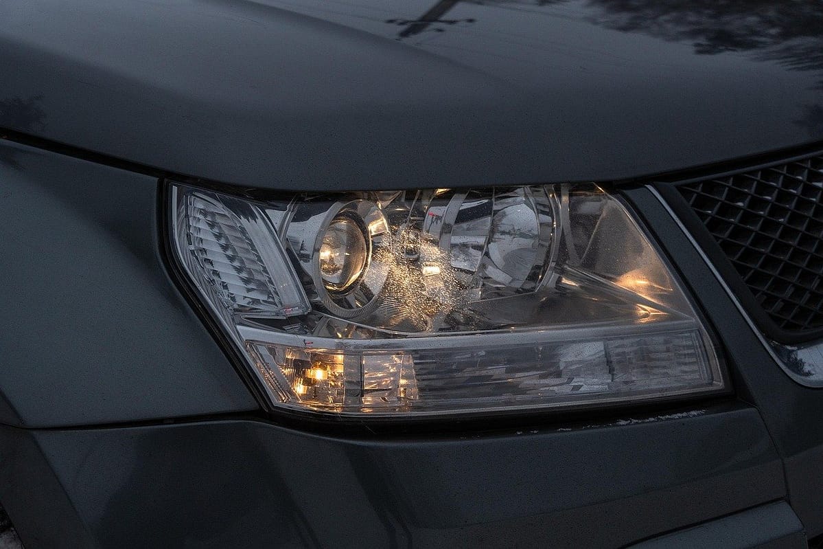 Professional headlight restoration service restoring cloudy car headlights to clear finish